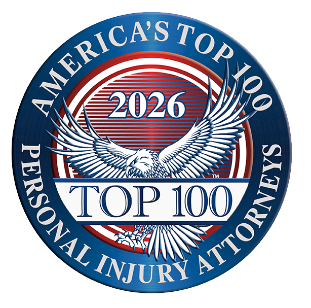Circular emblem for Americas Top 100 Personal Injury Attorneys 2026, featuring a bald eagle with outstretched wings.